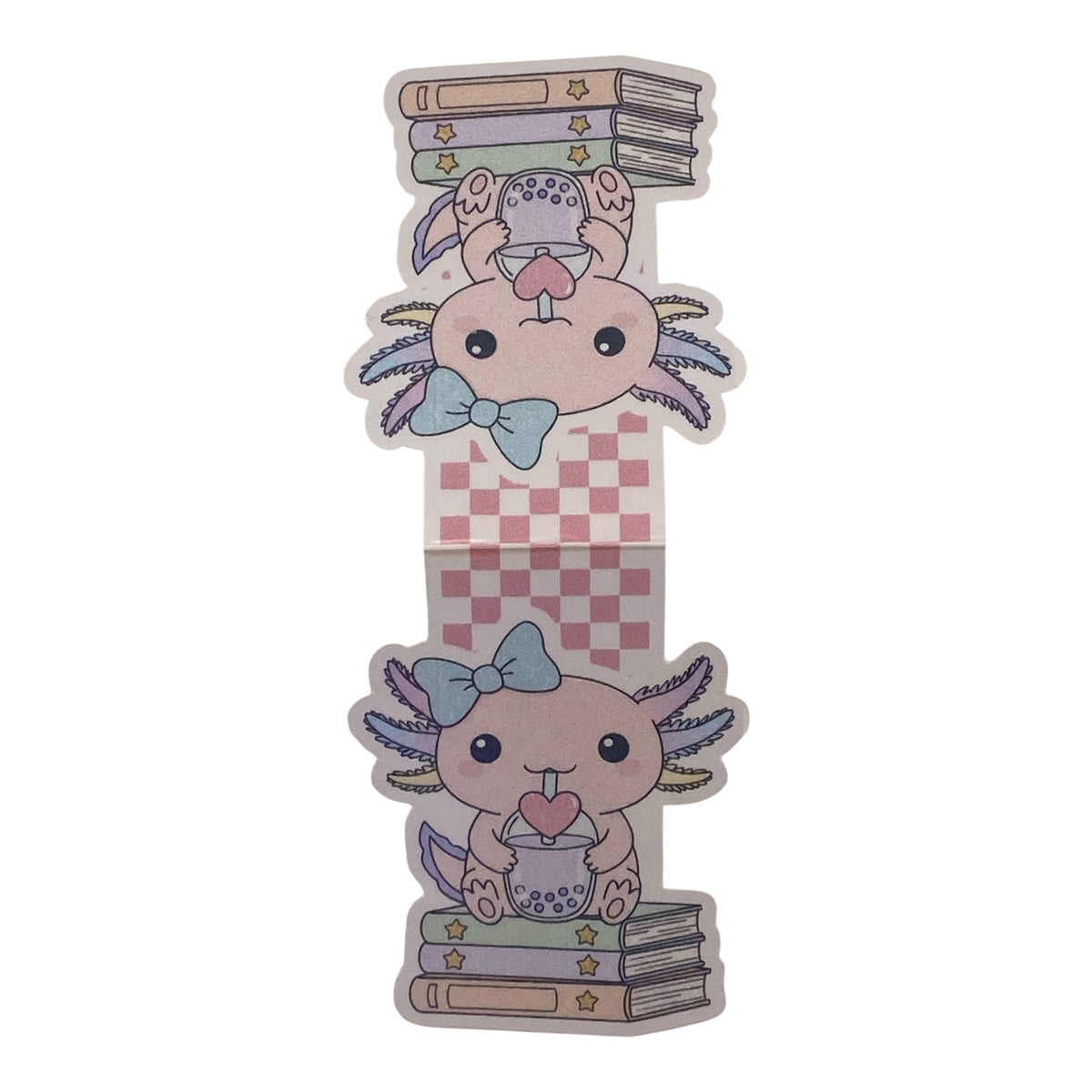A decorative magnetic bookmark featuring a cute cartoon creature with long ears, a blue bow, and a pink-and-white checkered body, shown with stacked books above and below on a plain white background.