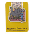 A cute gray cartoon cat magnetic bookmark on a yellow backing card. The bookmark features a gray cat sitting on pink and blue books with hearts.
