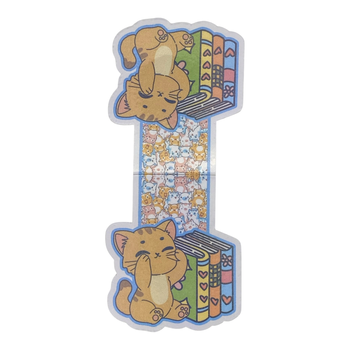 A magnetic bookmark featuring a cute orange tabby cat illustration with books on either side, shown on a plain white background.