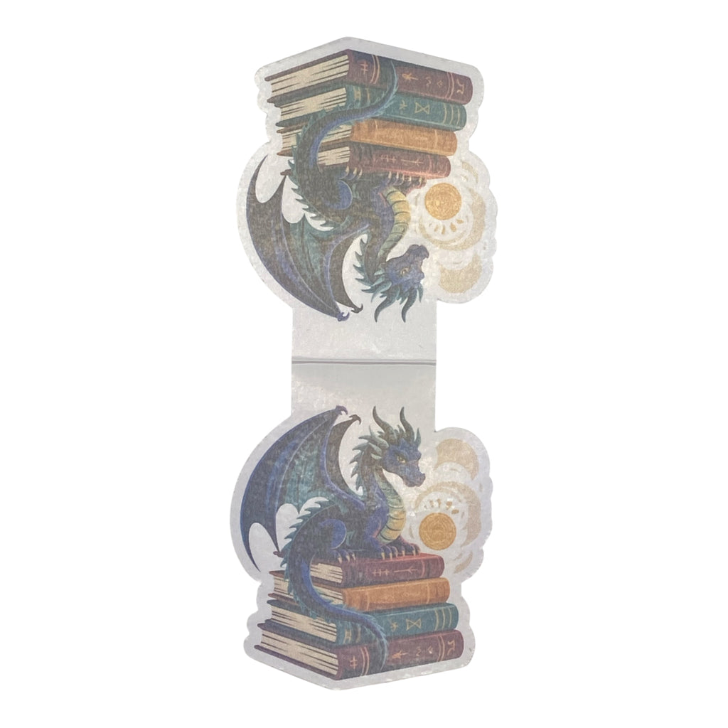 A magnetic bookmark featuring an illustration of a blue dragon wrapped around a stack of old books, with gold coin details, shown on a plain white background.